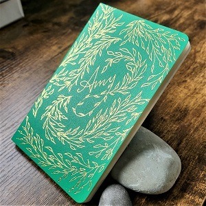 Small Moleskin note book with name and leaf design in hot foil