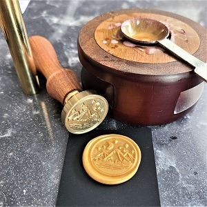 Wax seal of mountain and sky with wax seal tools