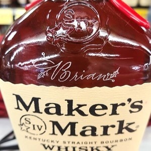 The name, "Brian," engraved on a Maker's Mark whisky bottle